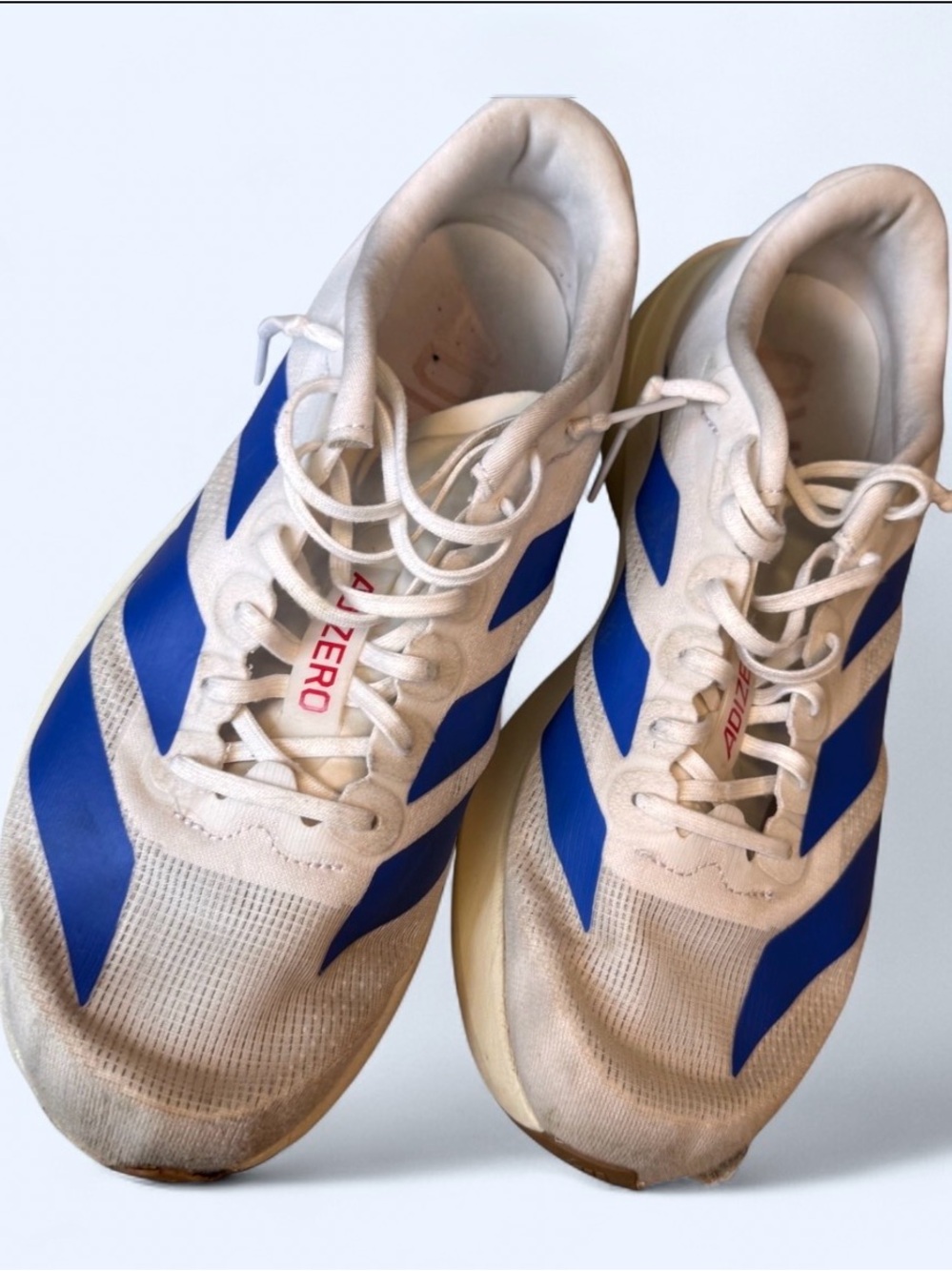 adidas adizero Men's Sneakers in White with Blue Accents